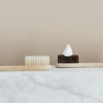 photo of toothpaste on toothbrush