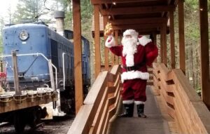 Santa waves hello from the Christmas train