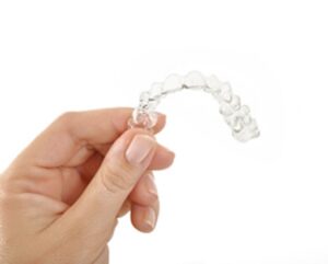 An Invisalign clear aligner.